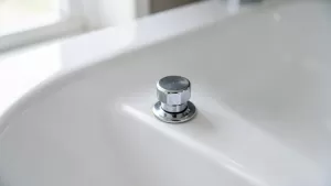 jak zamontować korek klik klak w umywalce